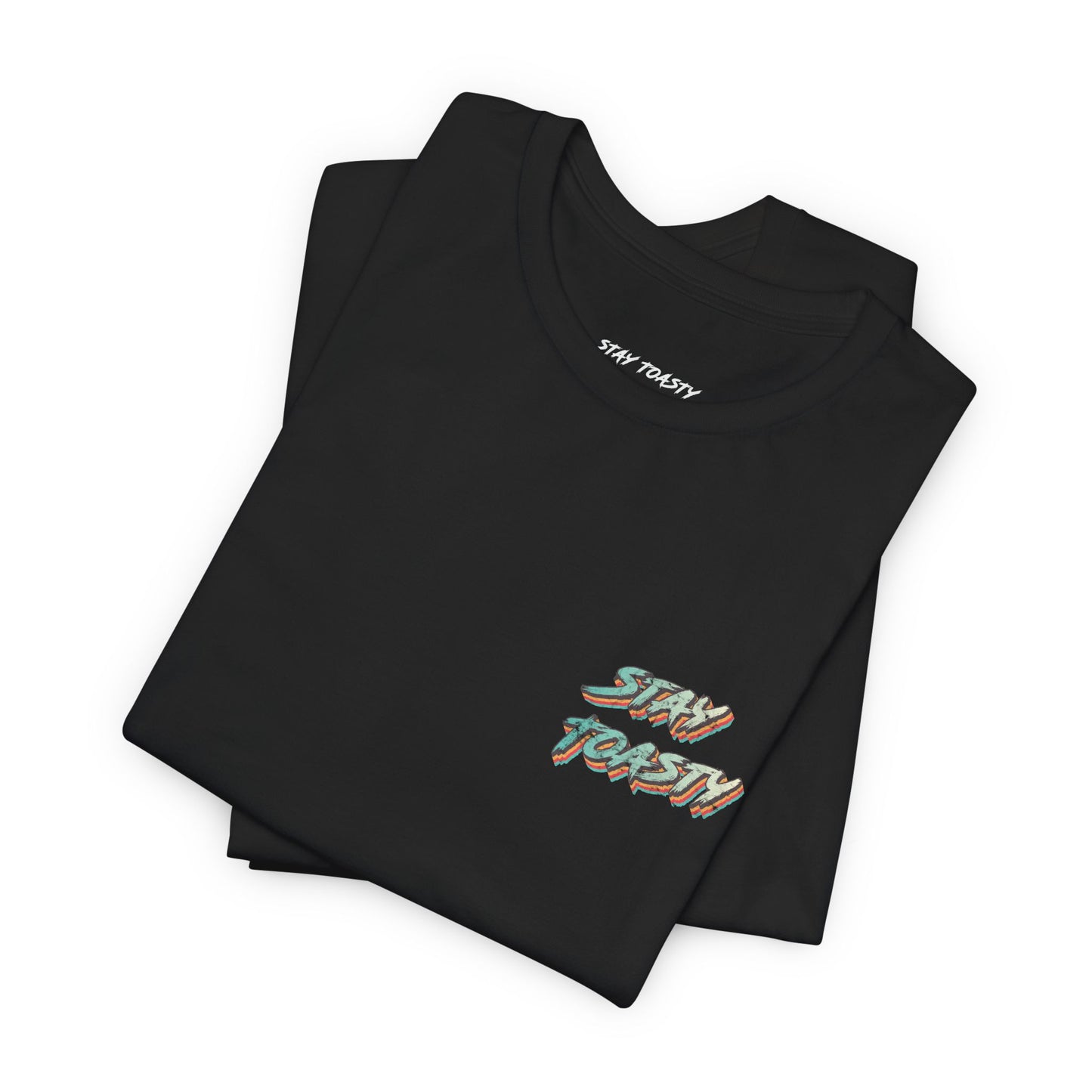 Folded black T-shirt with vintage ‘Stay Toasty’ text design on front chest