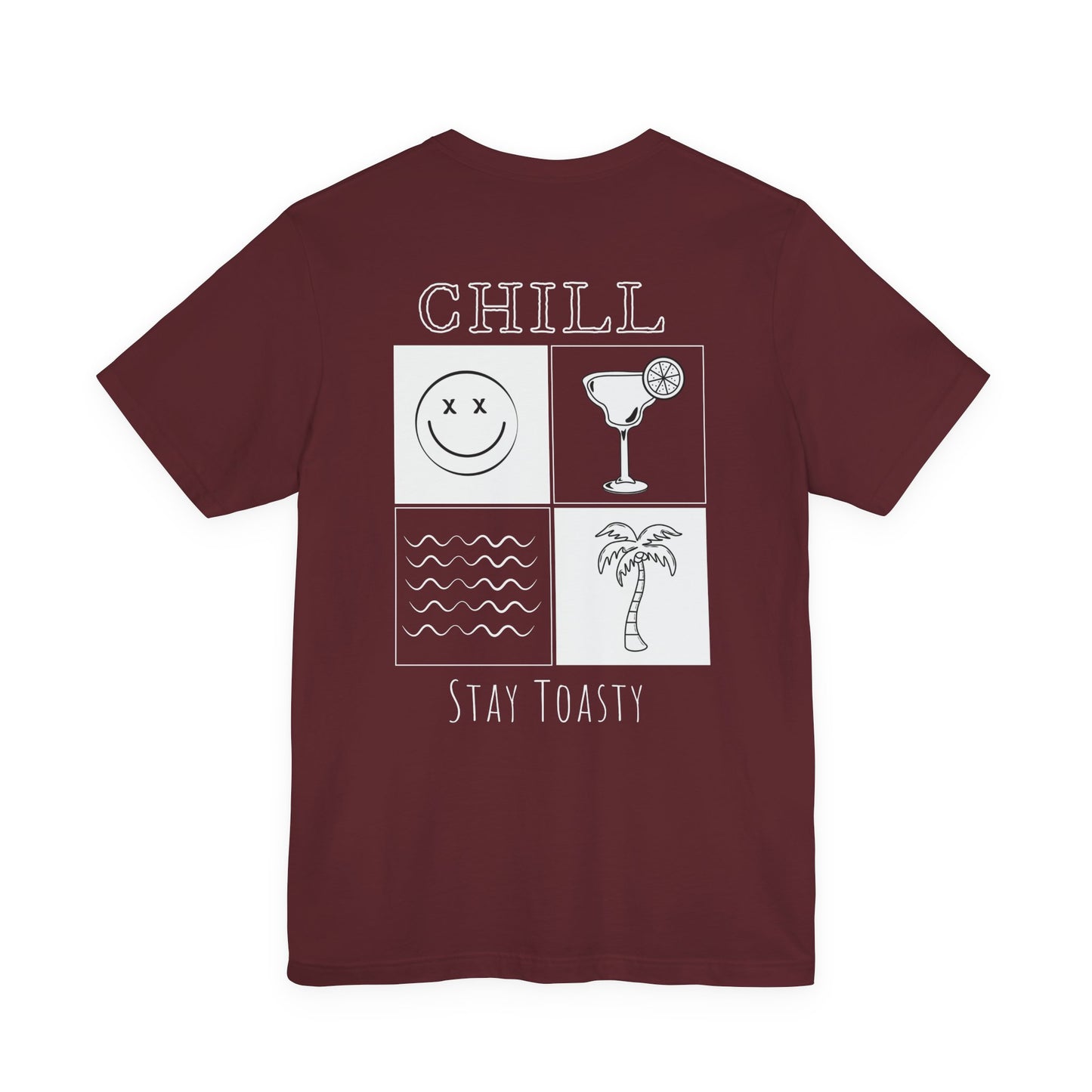 A maroon graphic t-shirt with large white graphic print on the back featuring the text 'CHILL' with four square icons showing a smiley face, a cocktail, waves, and a palm tree. and 'STAY TOASTY' at the bottom.