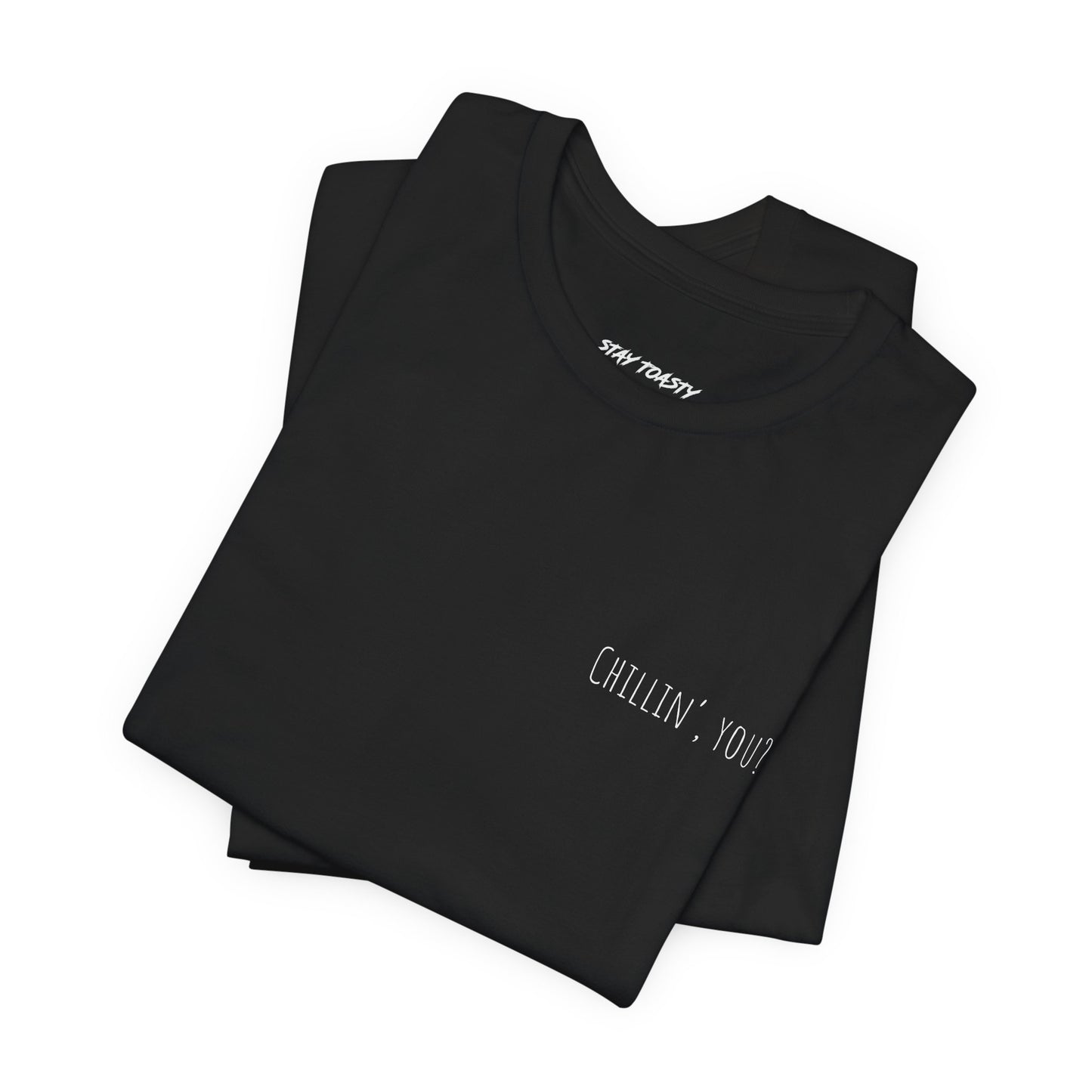 Folded black t-shirt with 'Chillin, you?' print on front chest.