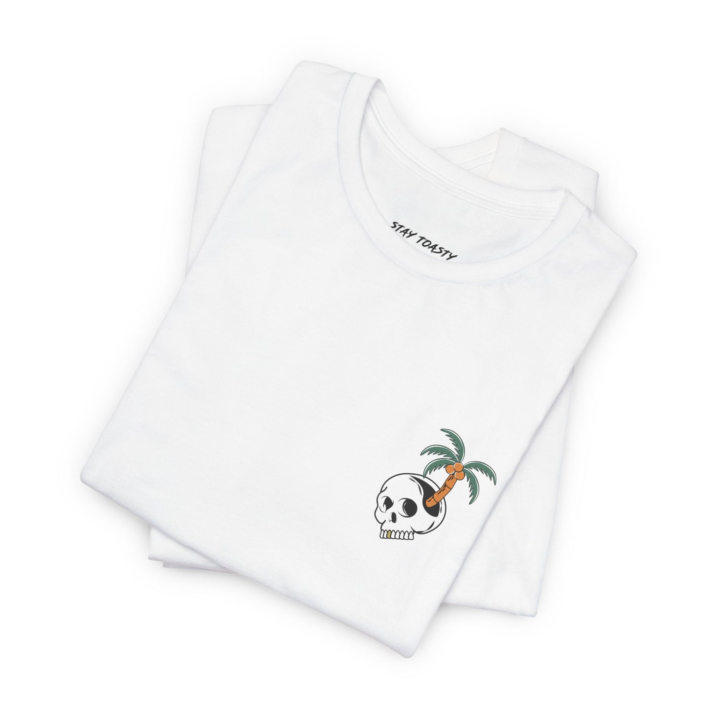 Folded white Paradise State of Mind tee showing small skull and palm tree front chest logo