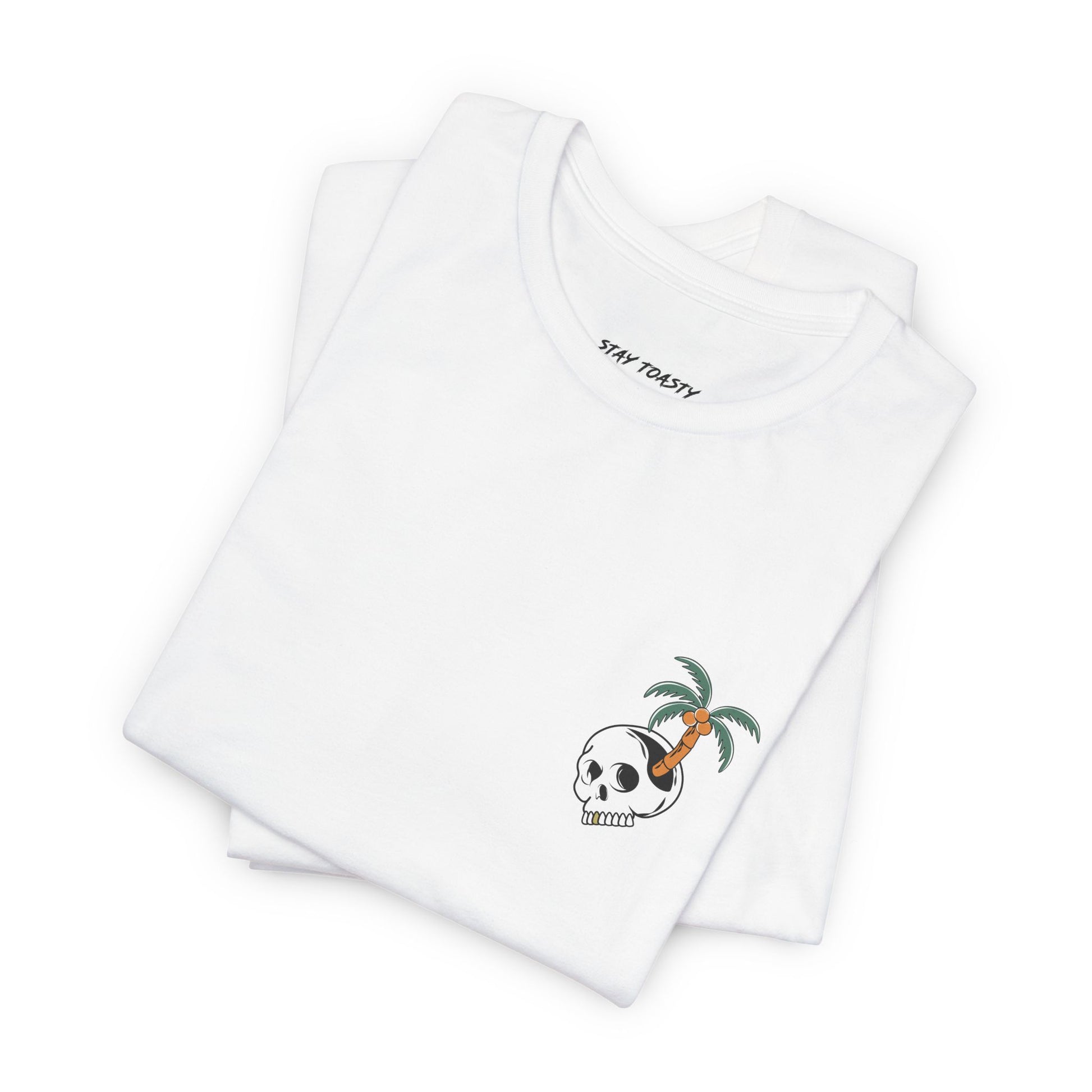 Folded white Paradise State of Mind tee showing small skull and palm tree front chest logo
