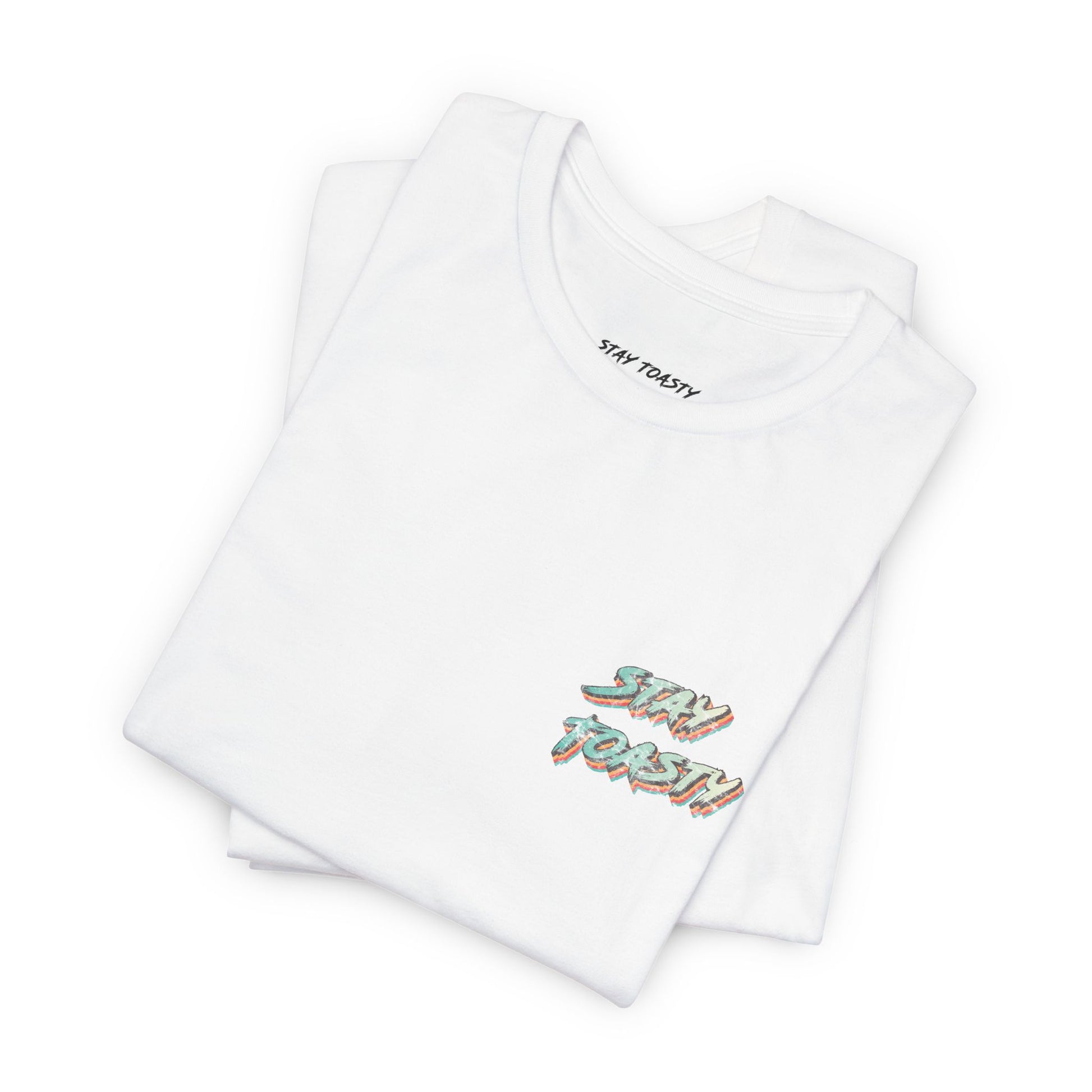 Folded white T-shirt with vintage ‘Stay Toasty’ text design on front chest