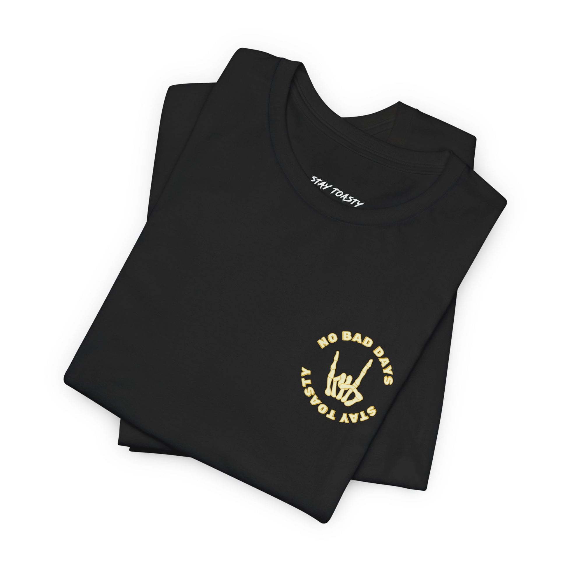 Black graphic tee with skeleton hand with text "No Bad Days" and "Stay Toasty". Folded front view.