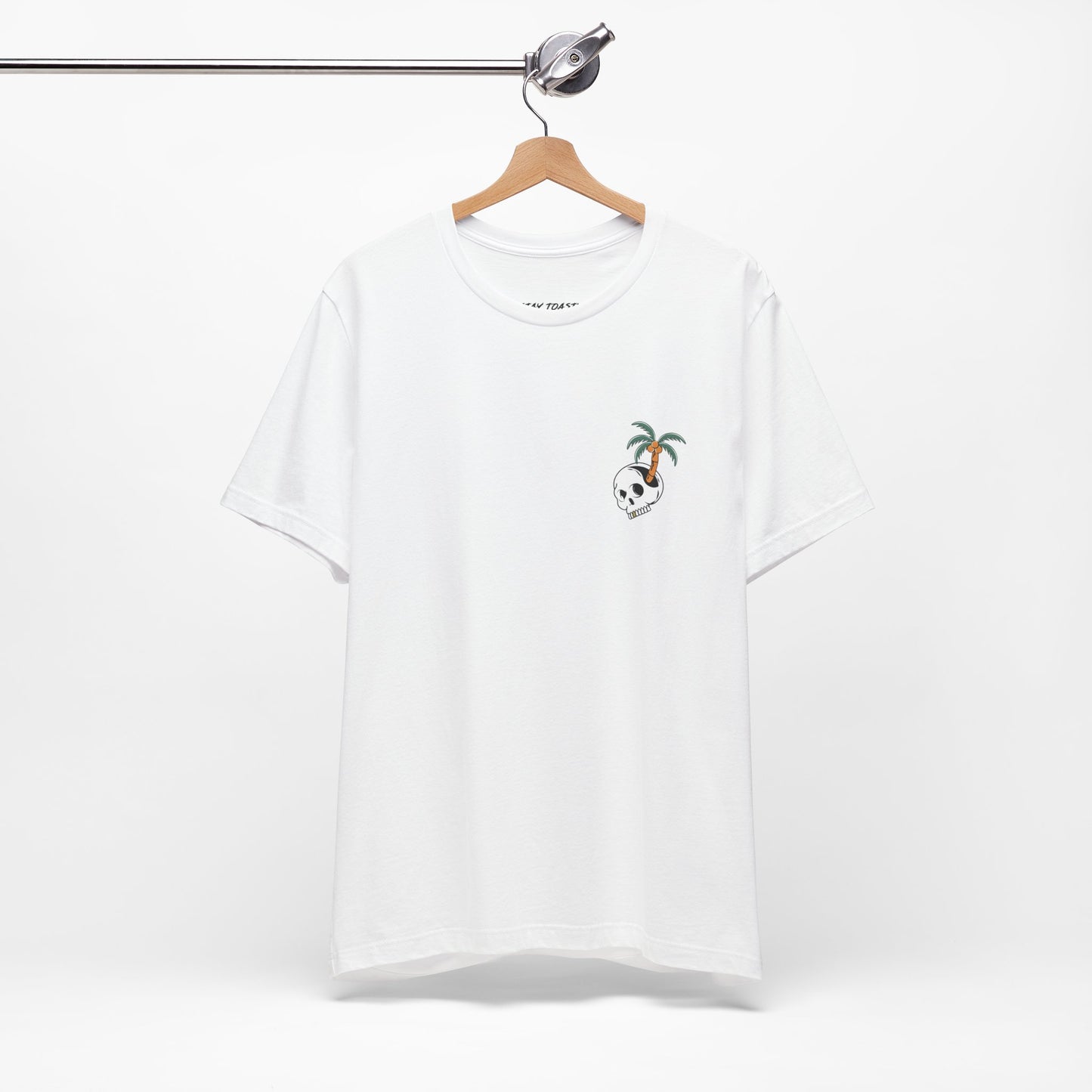 Paradise State of Mind white graphic tee hanging showing front chest skull and palm tree design