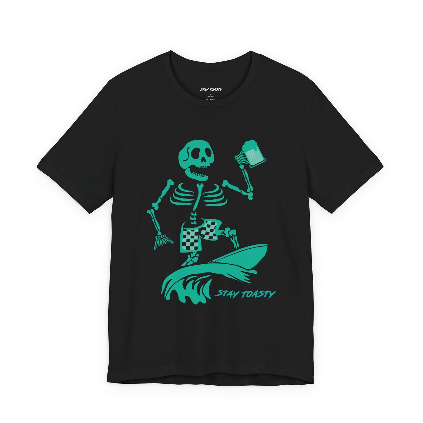 Black graphic tee with skeleton surfing a wave with checkered board shorts holding a beer. Stay Toasty logo under the wave. Front View.