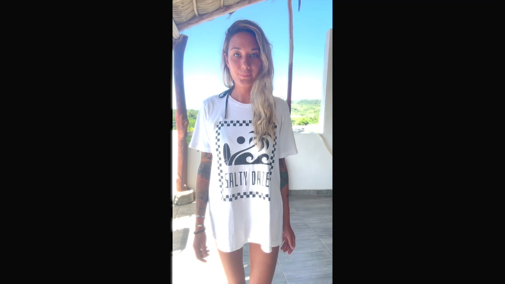 Load video: Unisex Tee Size Guide for Oversized fit on women