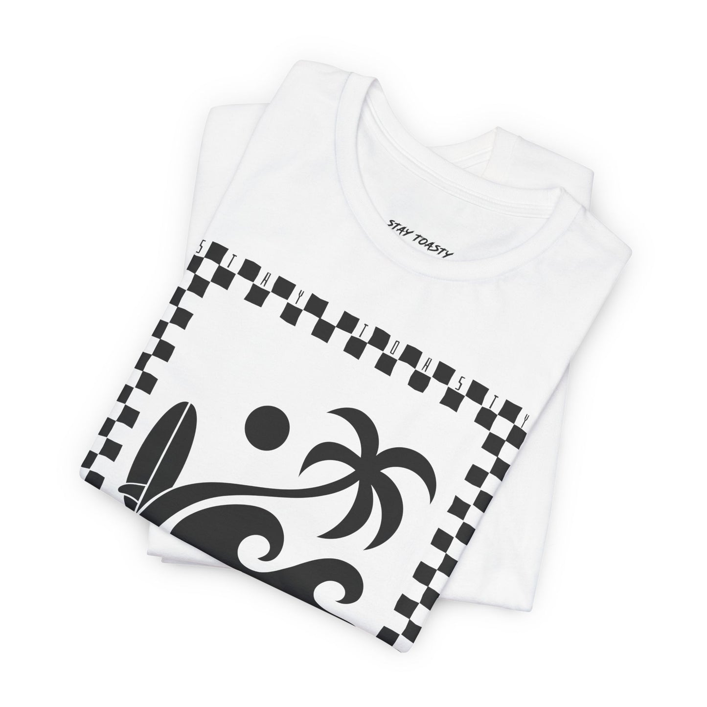 White graphic tee with beach graphics. Outlined in a checkers. Large front graphic. Folded view.