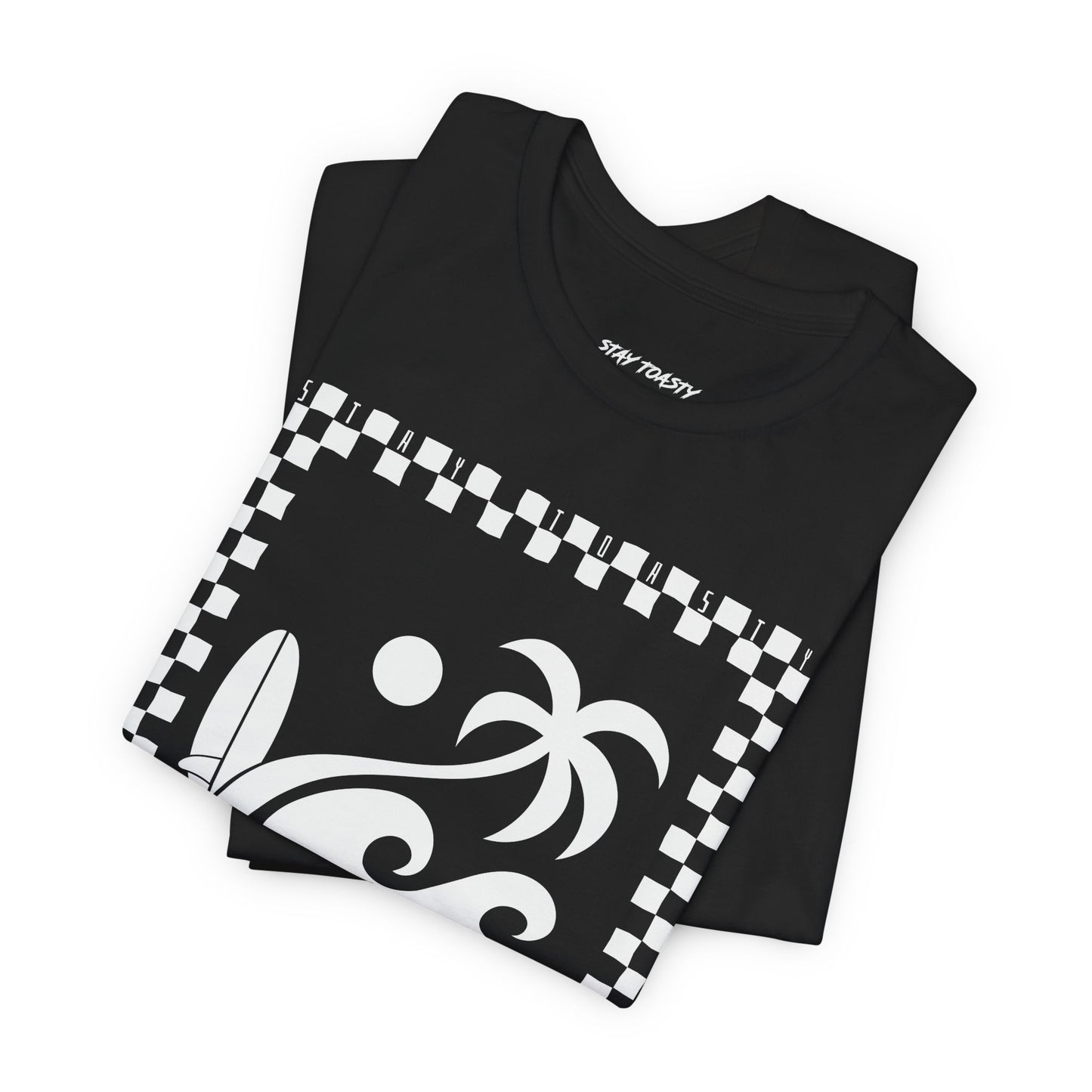 Folded black graphic tee with surf beach graphics with 'SALTY DAZE' text and 'Stay Toasty' inside of a checkered outline.