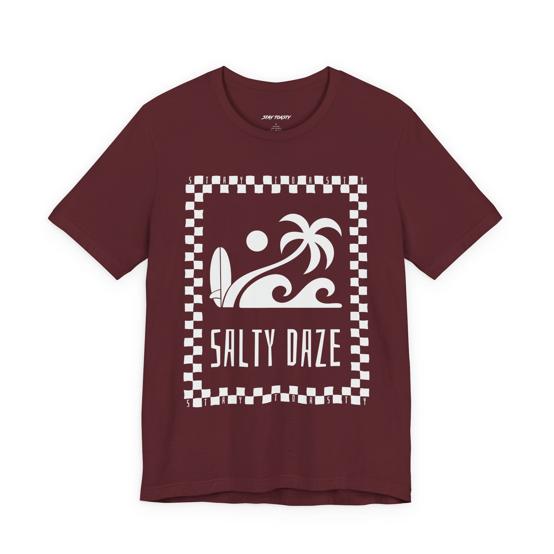Maroon graphic tee with surf beach graphics with 'SALTY DAZE' text and 'Stay Toasty' inside of a checkered outline.