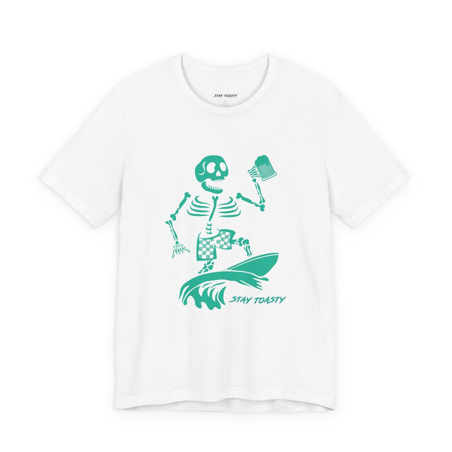 A white graphic tee featuring a green graphic of a skeleton surfing on a wave with a beer and the text 'STAY TOASTY' printed below.