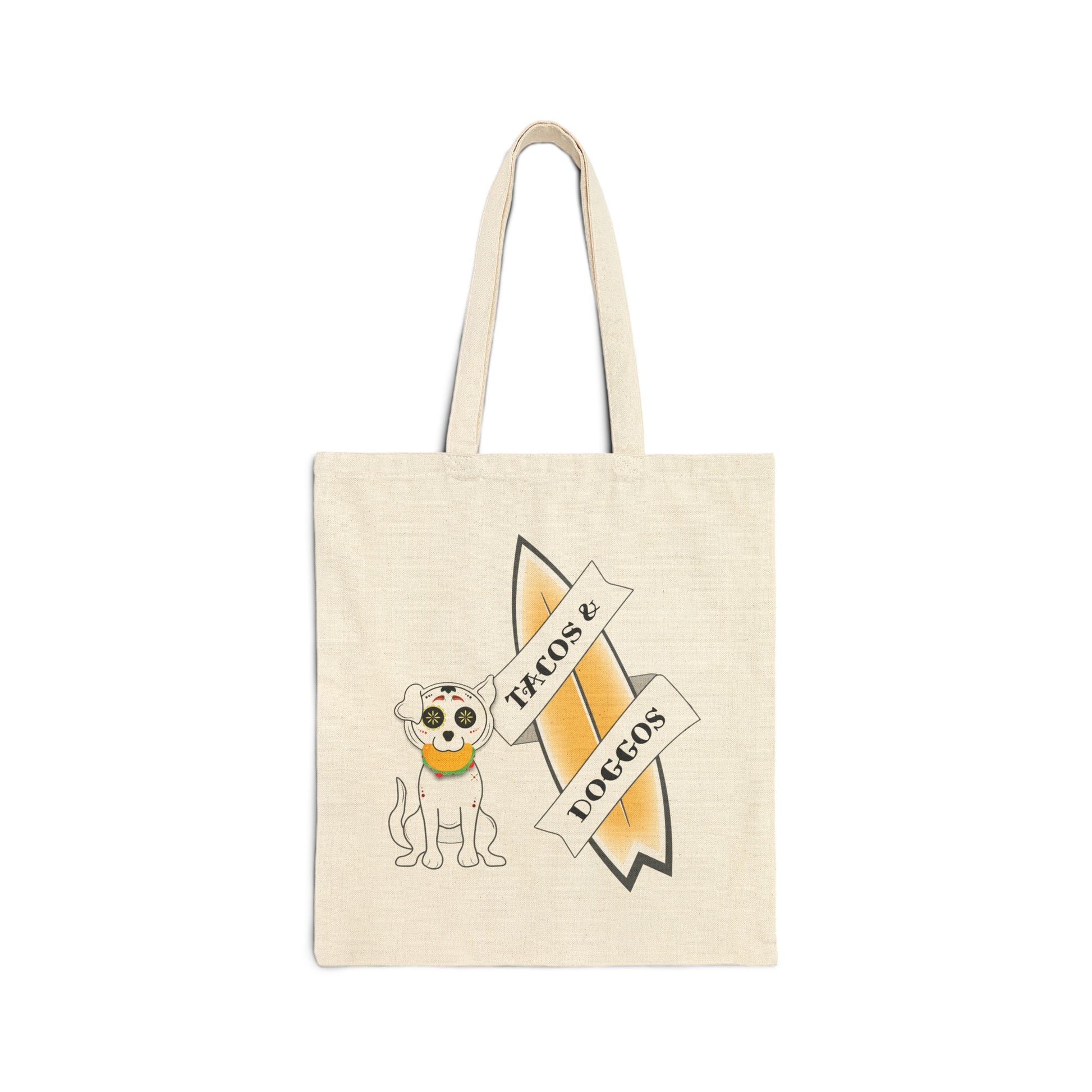 Beige tote bag with a sugar skull dog with a taco in his mouth with text 'TACOS & DOGGOS'