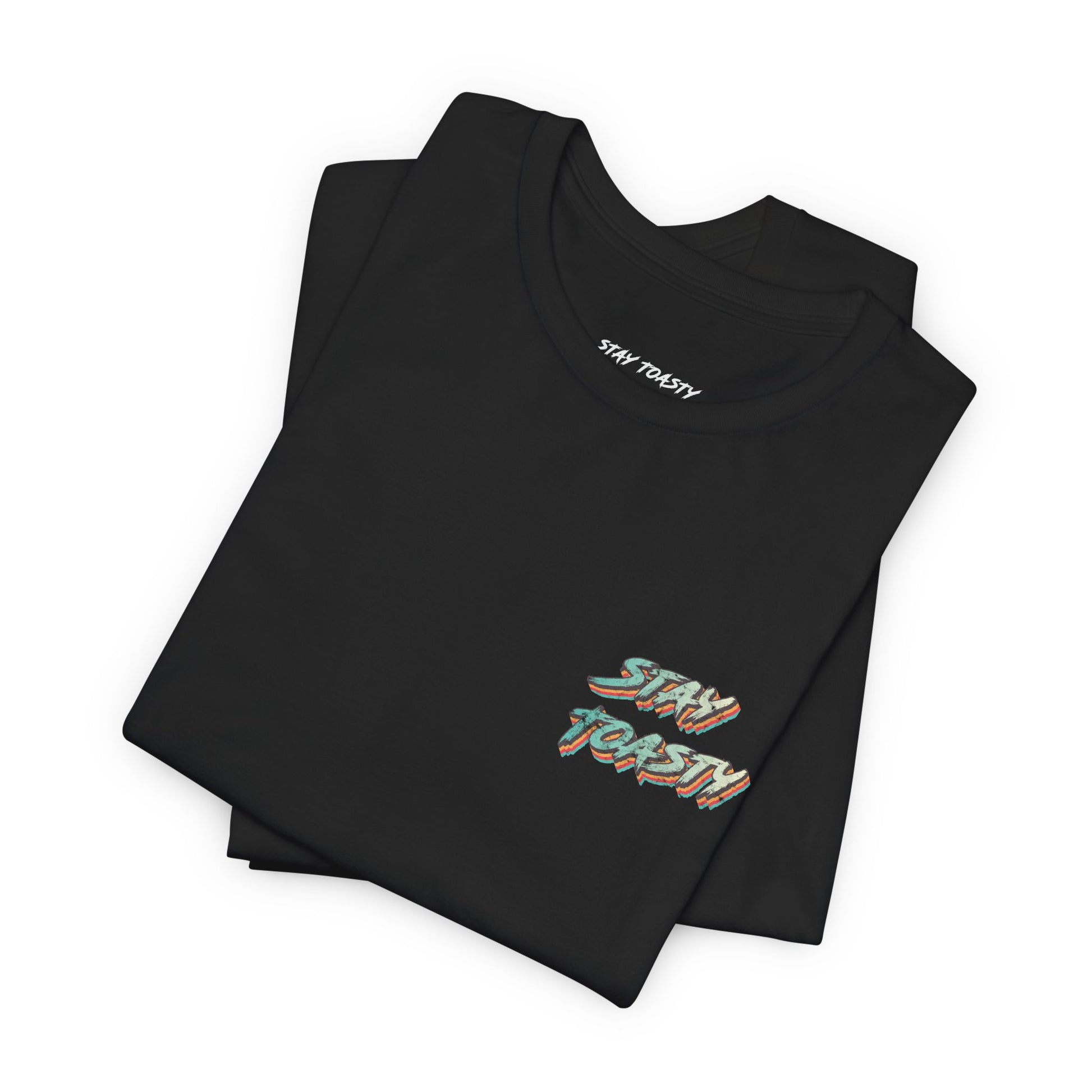 Black graphic tee with vintage style text reading "Stay Toasty" on front chest. Front, folded view.