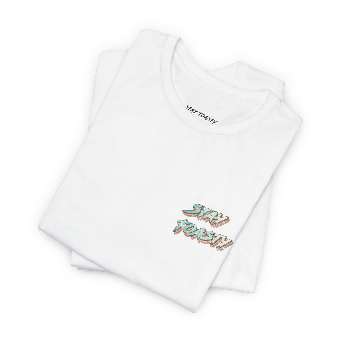 White graphic tee with vintage style text reading "Stay Toasty". Front, folded view.