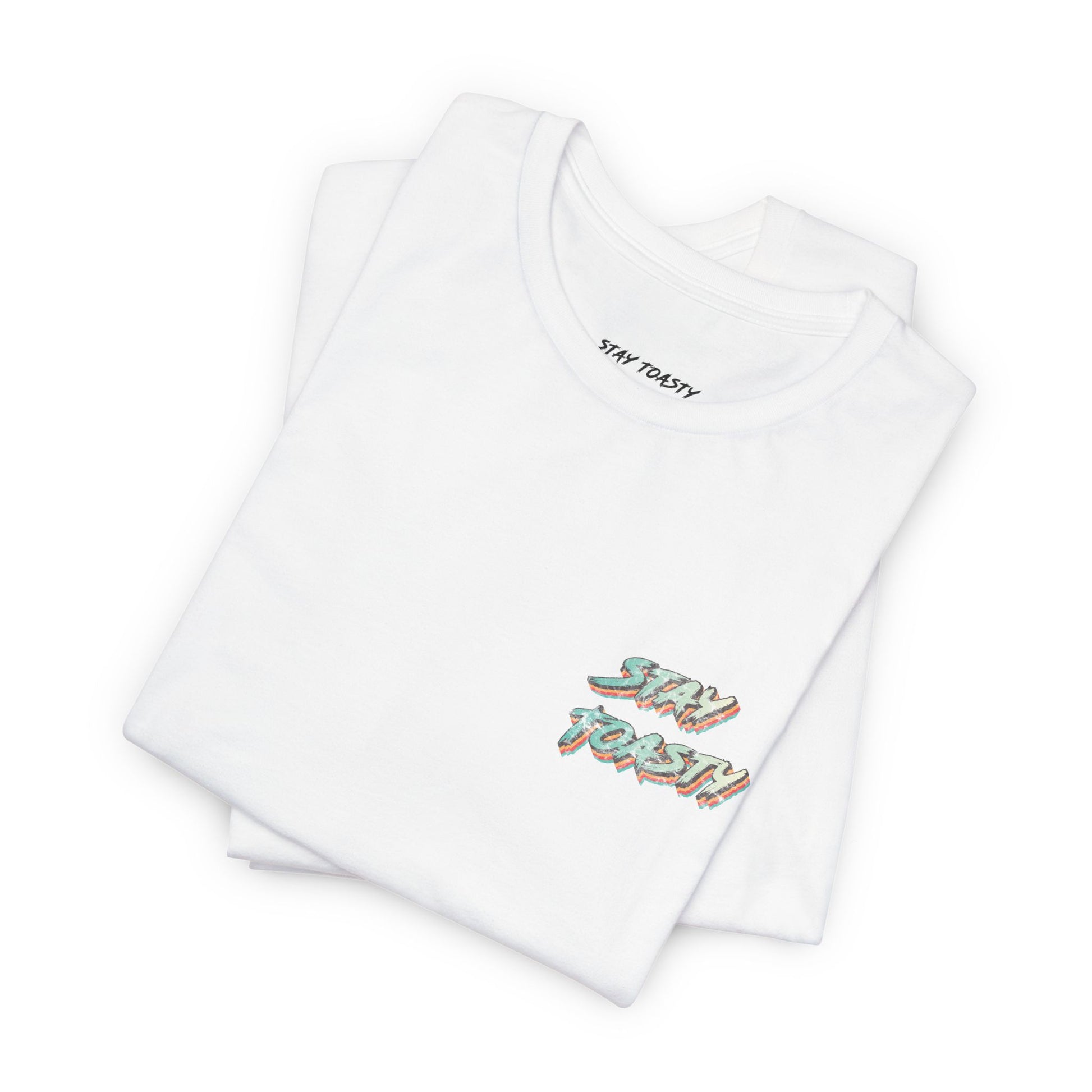 White graphic tee with vintage style text reading "Stay Toasty". Front, folded view.