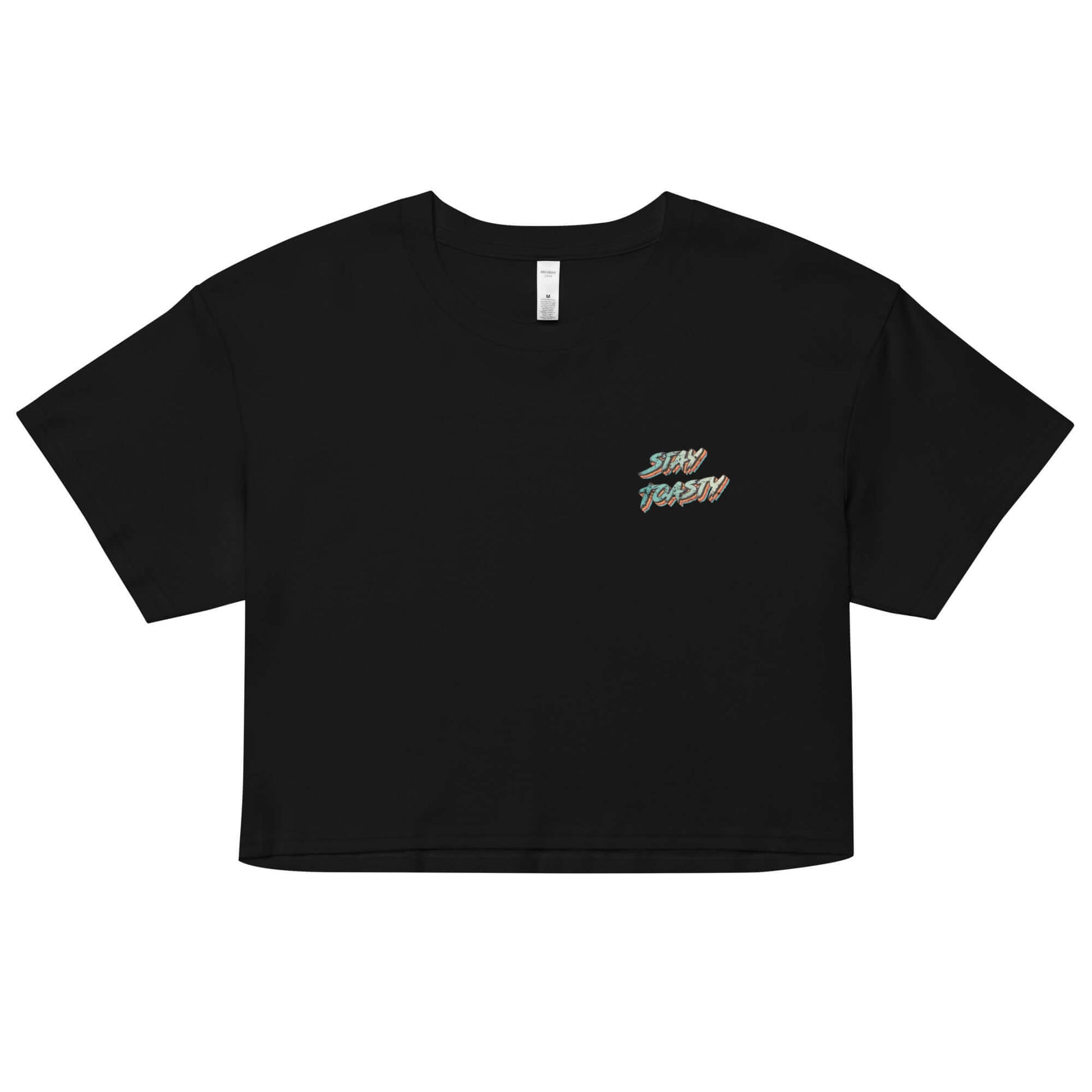 Womens graphic crop top. Retro font that says "Stay Toasty" with a vintage finish- front. Black.