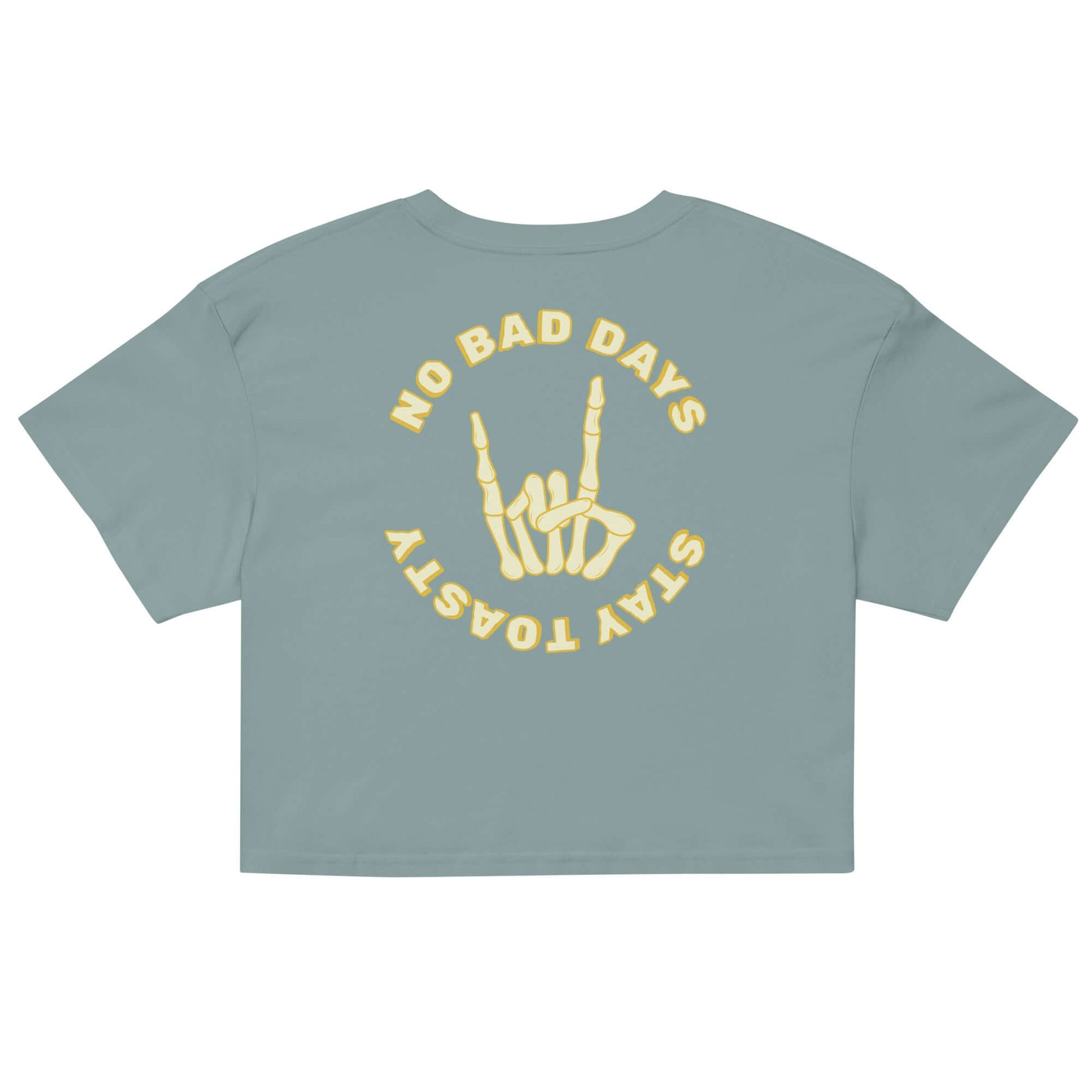 Womens graphic crop top. "No Bad Days" with a skeleton hand - back. Green.