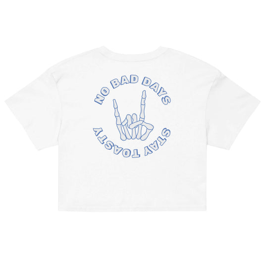 Womens graphic crop top. "No Bad Days" with a skeleton hand - back. White.